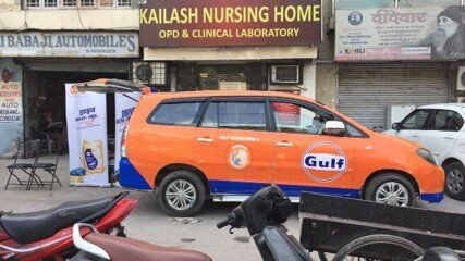 Gulf Oil branded promotional vehicle on the street