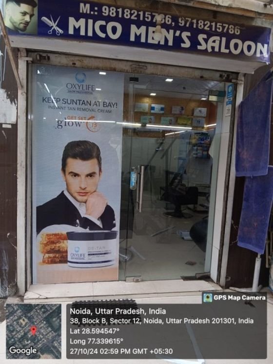 Oxylife in-shop branding poster at a men's salon